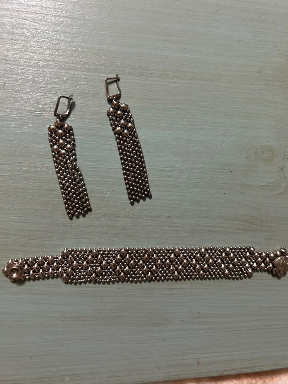 Sergio Gutierrez Liquid Metal Snap Bracelet W/ Matching Dangle Earrings.